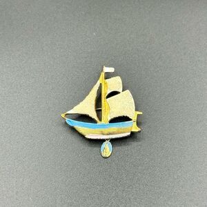 Vintage enamel sailing boat with Mary medal